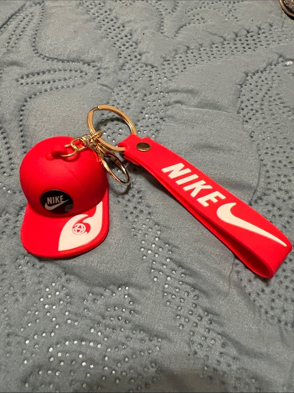 Nike Red Silicone Strap Keychain with Mini Cap Charm